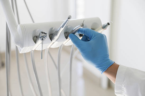 Professional Tooth Extraction technician working in Shirley, NY